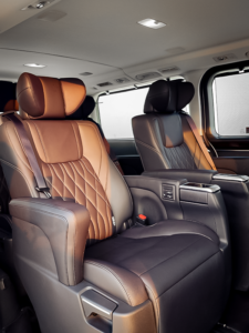 Interior view of a luxury Carl in Dubai with a grand entrance and stunning skyline backdrop